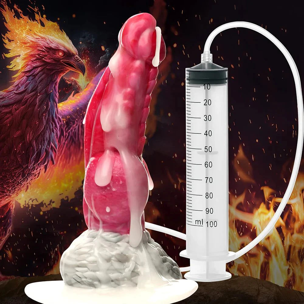 Creature Cocks Resurrector Phoenix Squirting Silicone Dildo with syringe and flame background.