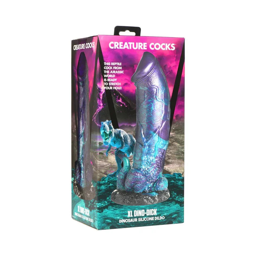 Creature Cocks XL Dino Dick Dinosaur Silicone Dildo in packaging featuring colorful design with glittering blues, blacks, purples, and teals.