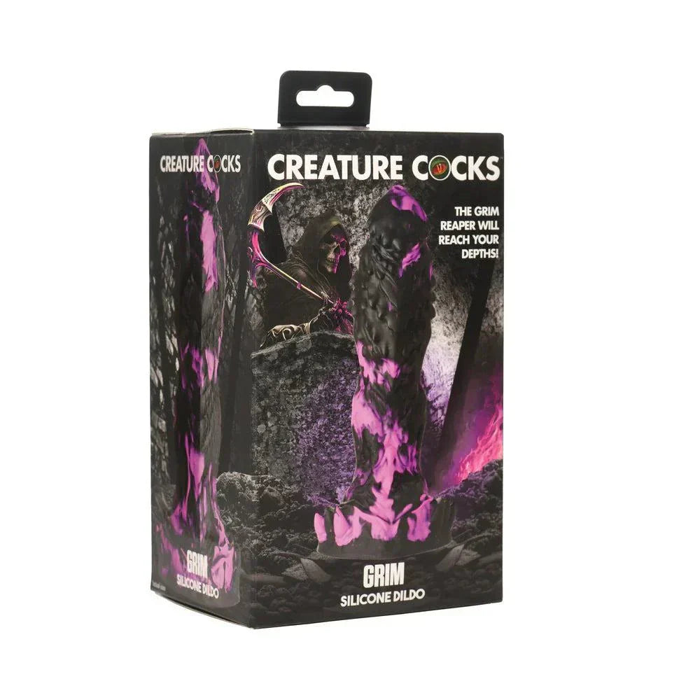 Creature Cocks Grim Silicone Dildo in box, featuring purple and black design with textured spikes.