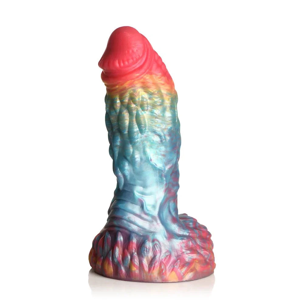 Rainbow-colored vibrating silicone dildo with mystical phoenix design, textured shaft, and suction-cup base.