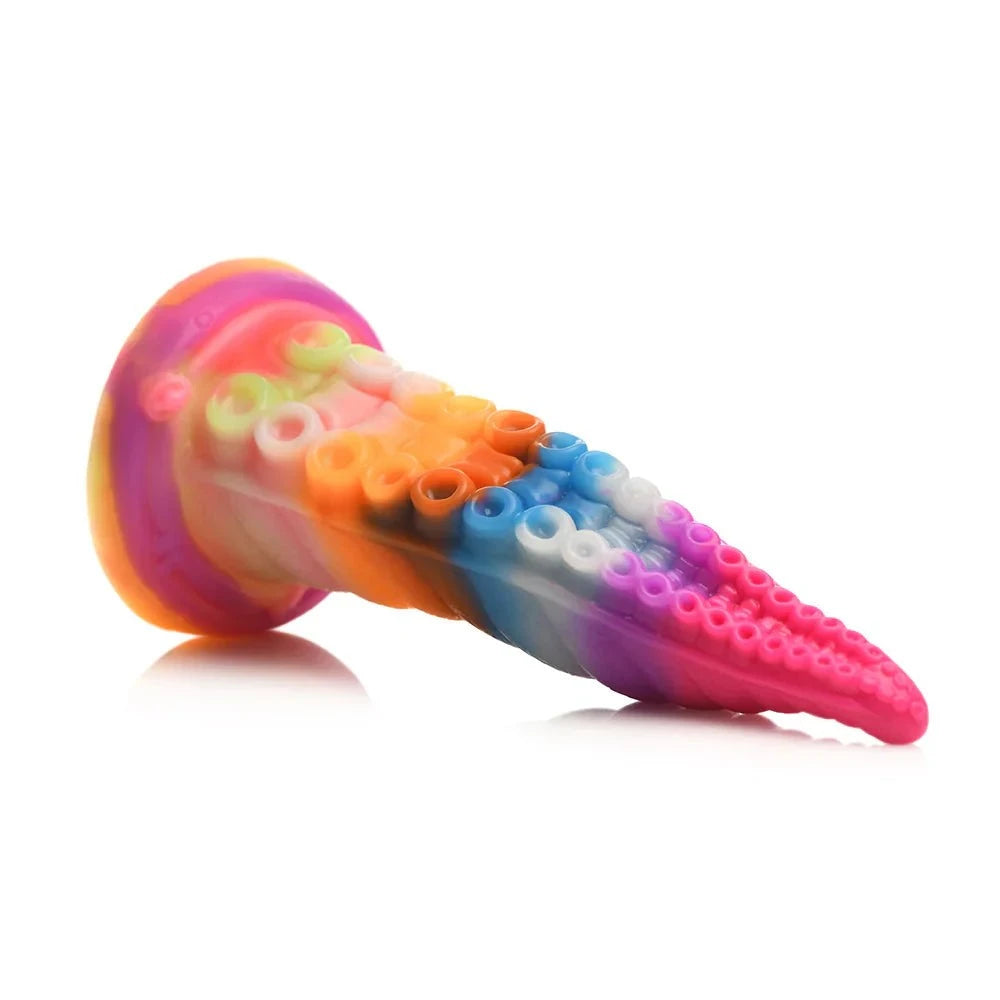 Creature Cocks Luminoctopus Glow-in-the-Dark Tentacle Dildo with rainbow colors and textured design.