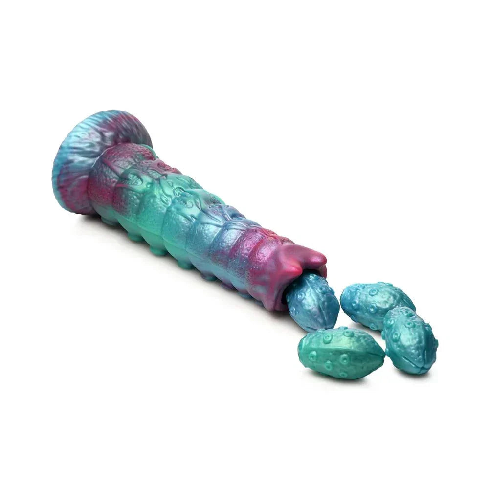 Creature Cocks Galactic Breeder Ovipositor Silicone Dildo with colorful segmented shaft and silicone eggs.