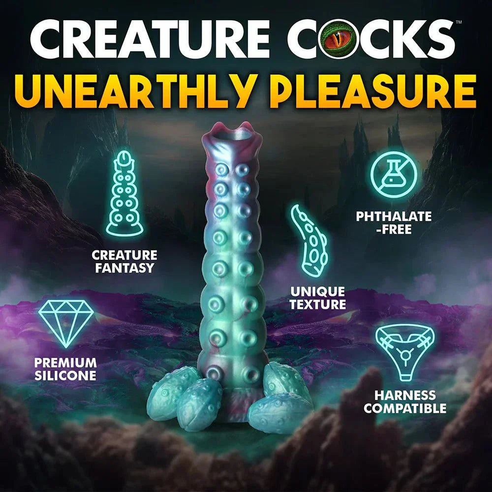 Creature Cocks Galactic Breeder Ovipositor Silicone Dildo with enchanting teal, red, and blue hues, featuring textured segments and four silicone eggs, harness-compatible and phthalate-free.