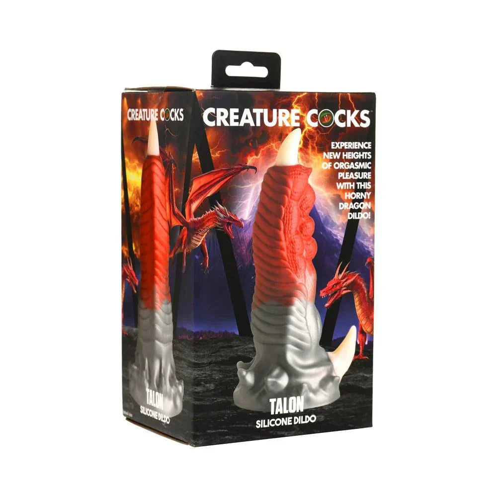 Creature Cocks Talon Silicone Dildo in packaging with dragon-inspired design and red and silver color.