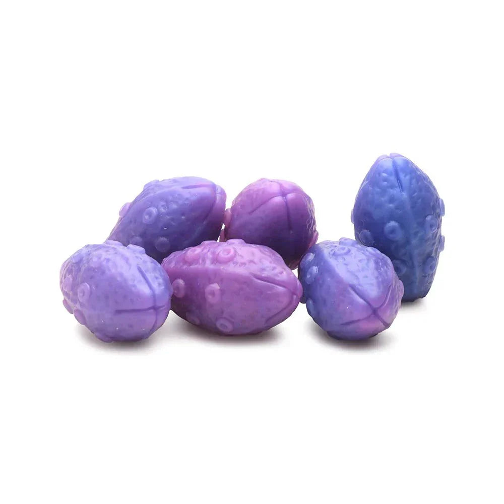Purple and blue silicone eggs for the Creature Cocks Tenta-Queen Ovipositor.