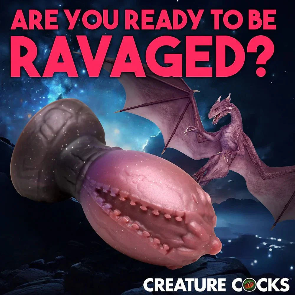 Creature Cocks Dragon Hatch Silicone Egg XL with glittery finish and textured design in fantasy world.