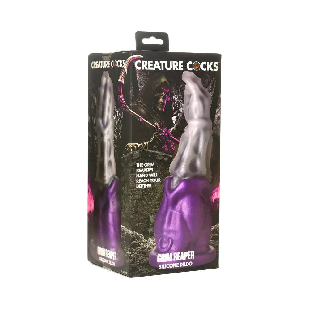 Creature Cocks Grim Reaper Silicone Dildo packaging with purple and silver design.