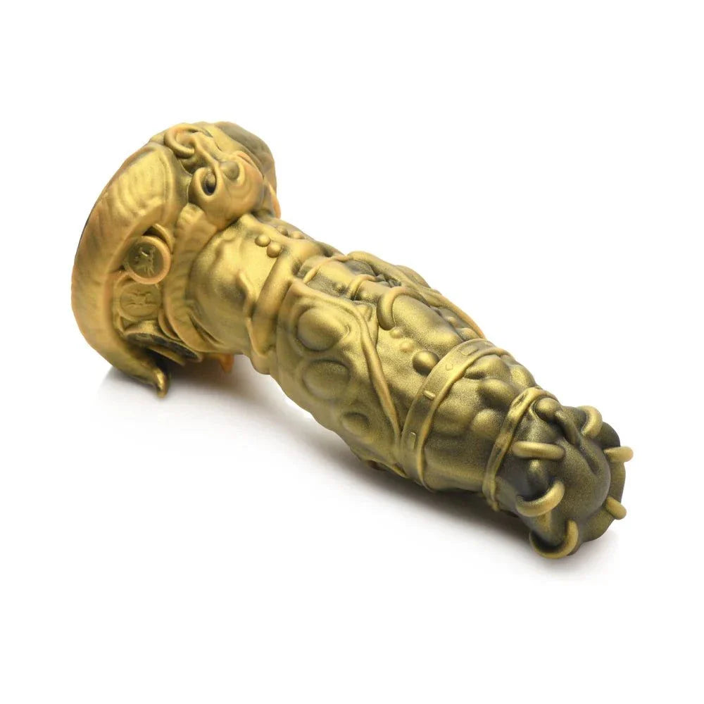 Creature Cocks King Minotaur gold-toned detailed silicone dildo with suction base and intricate design.