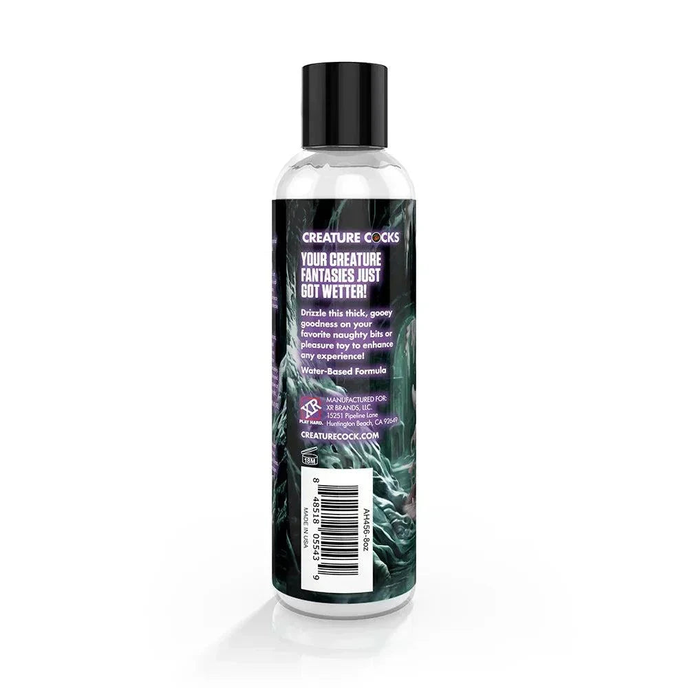 Creature Slime Creature Cum Unscented Jizz Lubricant 8 oz. bottle with black cap and label featuring vibrant design.