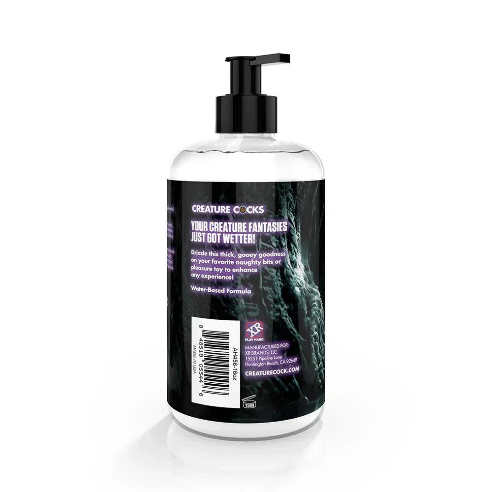Clear plastic pump bottle of Creature Slime Creature Cum unscented jizz lubricant with black label and sci-fi design