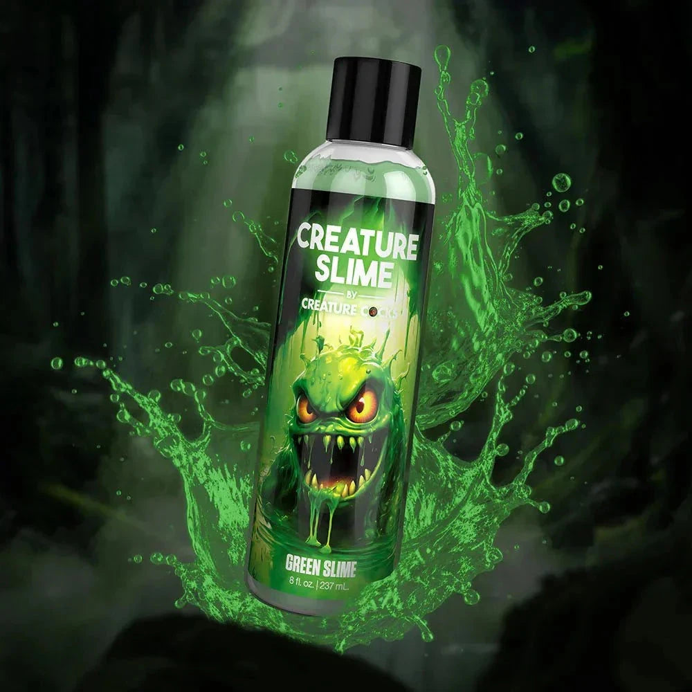 Creature Slime Green Water-Based Lubricant 8 oz bottle with vibrant green slime and fantasy-themed label.