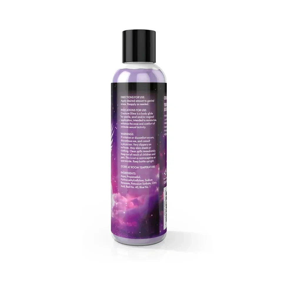Creature Slime Water-Based Lubricant bottle with cosmic design, smooth and long-lasting personal lubricant.