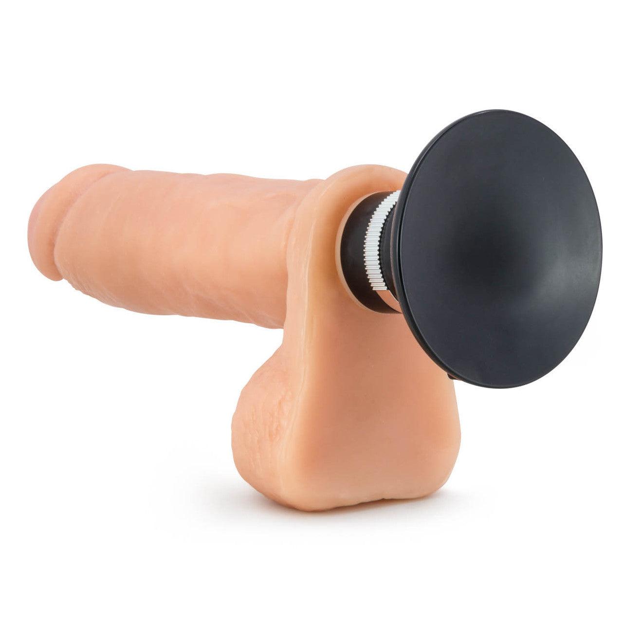 Blush Novelties Titan X5 Plus realistic vibrating dildo with suction cup base and adjustable speed dial