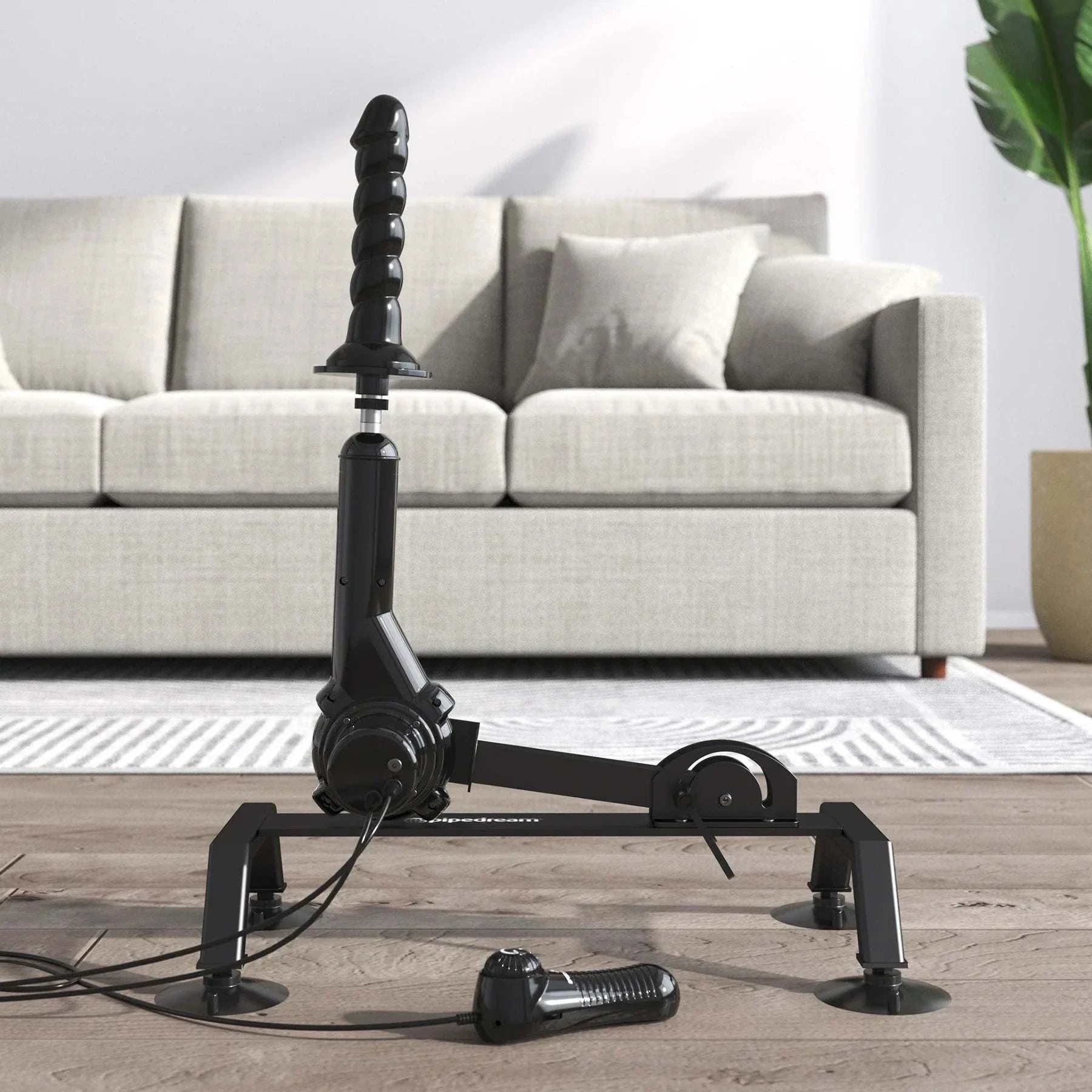 Fetish Fantasy Series Body Dock sex machine with sturdy steel frame, suction cup feet, adjustable thrust, and multi-speed controller in modern living room setting