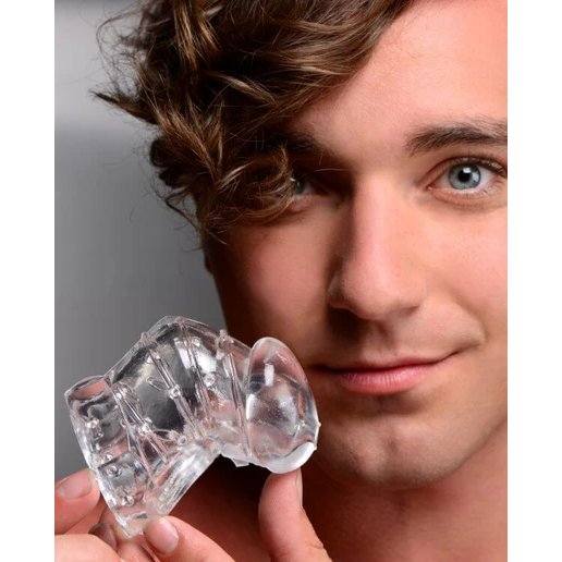 Clear Master Series Detained Soft Body Chastity Cage held by man