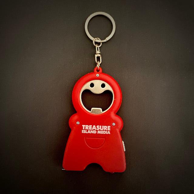 TIM 4-in-1 Keychain in red with bottle opener, flashlight, tape measure, and keyring by Treasure Island Media
