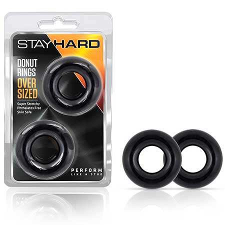 Blush Stay Hard Donut Rings Oversized Cockring 2-Pack Black in packaging with two black rings.