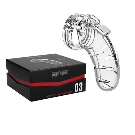 Clear Shots ManCage Model 03 Adjustable 4.5 in. chastity cock cage beside packaging.
