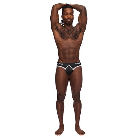 Male model wearing Male Power The Helmet black padded thong with branded waistband L/XL