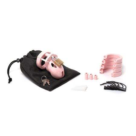 Mr. Stubb Ultimate Male Chastity Device in pink with adjustable rings, lock, keys, and storage pouch for BDSM play
