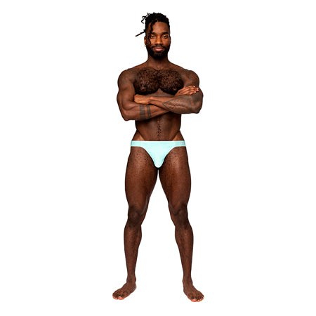 Male Power Easy Breezy Thong Sleeve in light blue worn by a model, showcasing comfort and style with thin straps and contoured pouch.