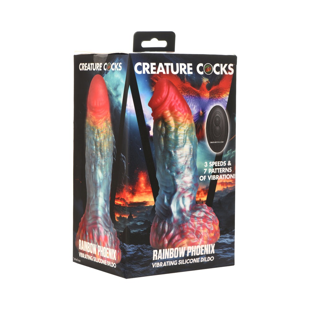 Creature Cocks Rainbow Phoenix Vibrating Silicone Dildo in packaging featuring vibrant colors and texture details.