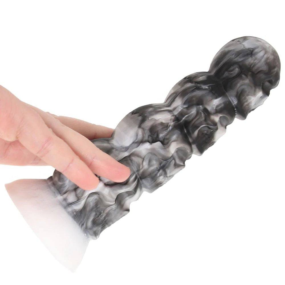 Creature Cocks Tower of Doom Silicone Dildo with stacked skull design and suction cup base for hands-free use