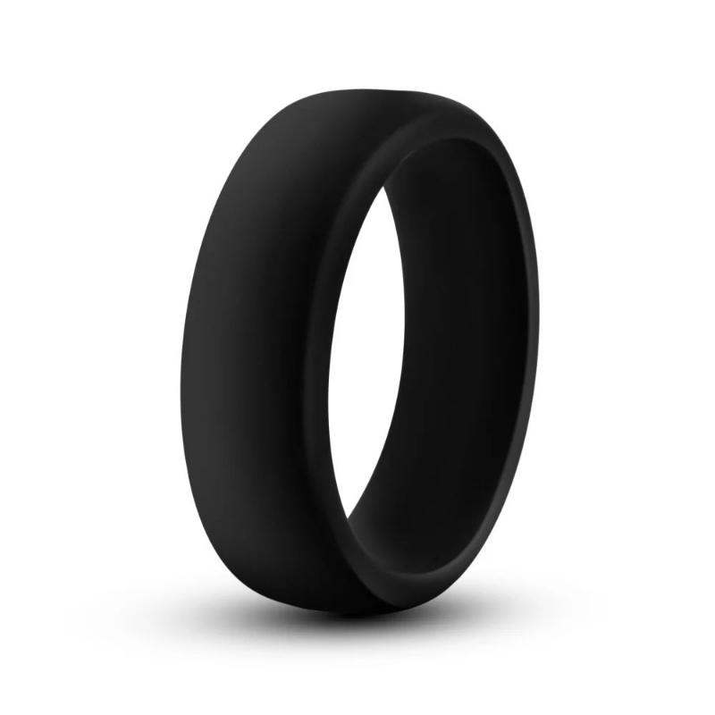 Black silicone cock ring with smooth texture and flat design for comfort and performance enhancement.