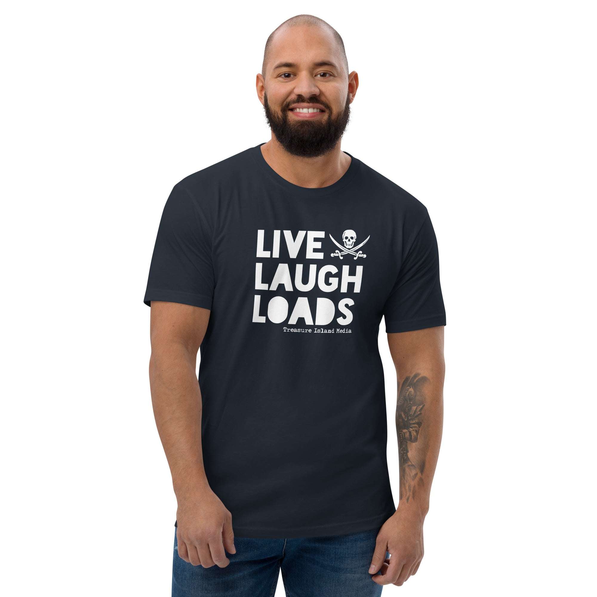 Live Laugh Loads T-shirt in black with bold white text design, worn by a smiling man.