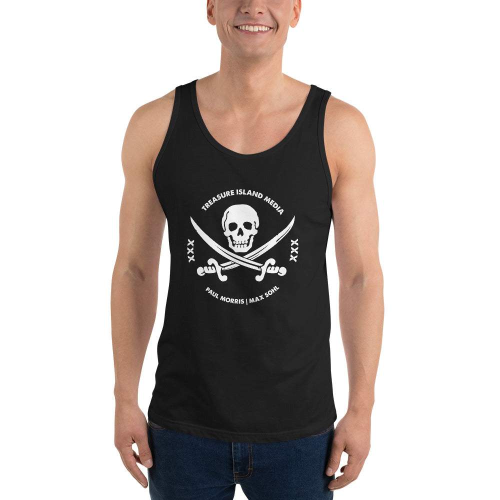 Male model wearing TIMXXX White Logo Tank Top, featuring iconic logo on front, sleeveless and relaxed fit, styled with jeans.