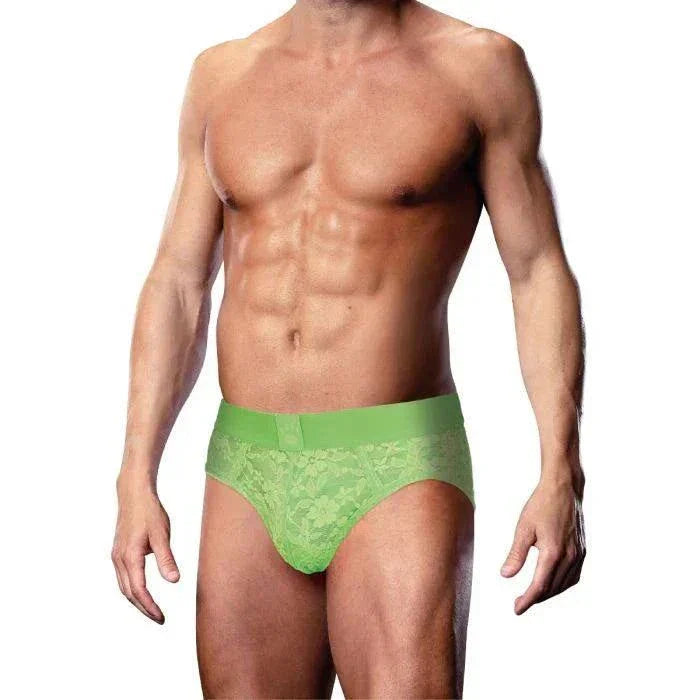 male model wearing green Prowler Lace Briefs with floral lace pattern and elastic waistband