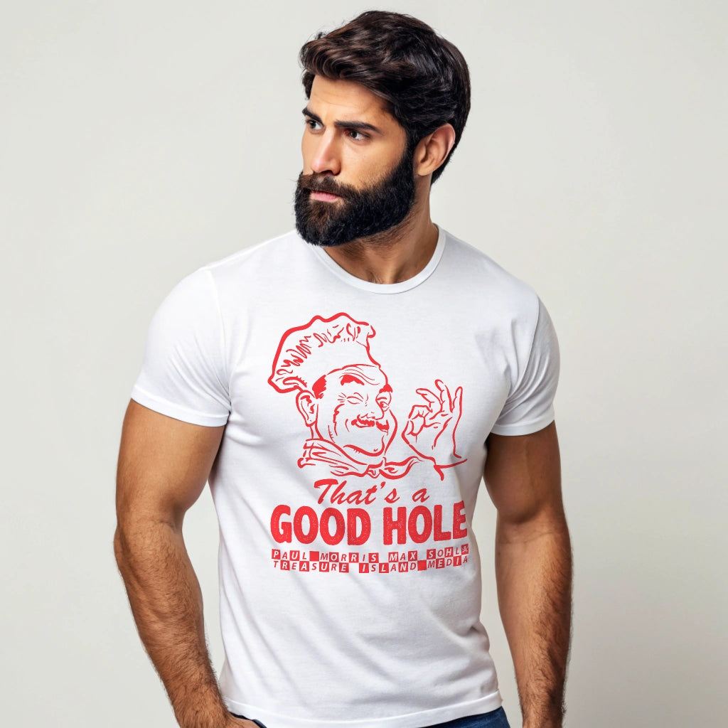 Man wearing white "That's a Good Hole" t-shirt with red graphic and text, featuring a chef illustration.
