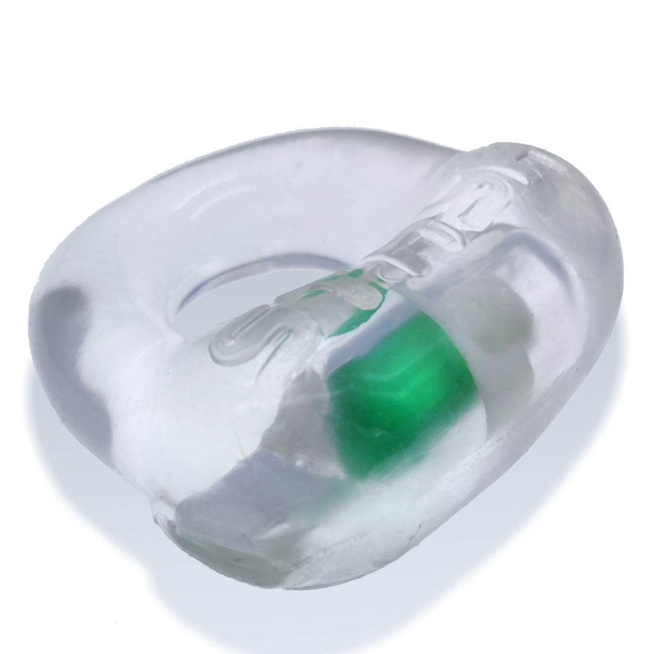 Clear silicone Oxballs Stash Cockring with aluminum capsule insert for discreet storage, designed to enhance pleasure and performance.