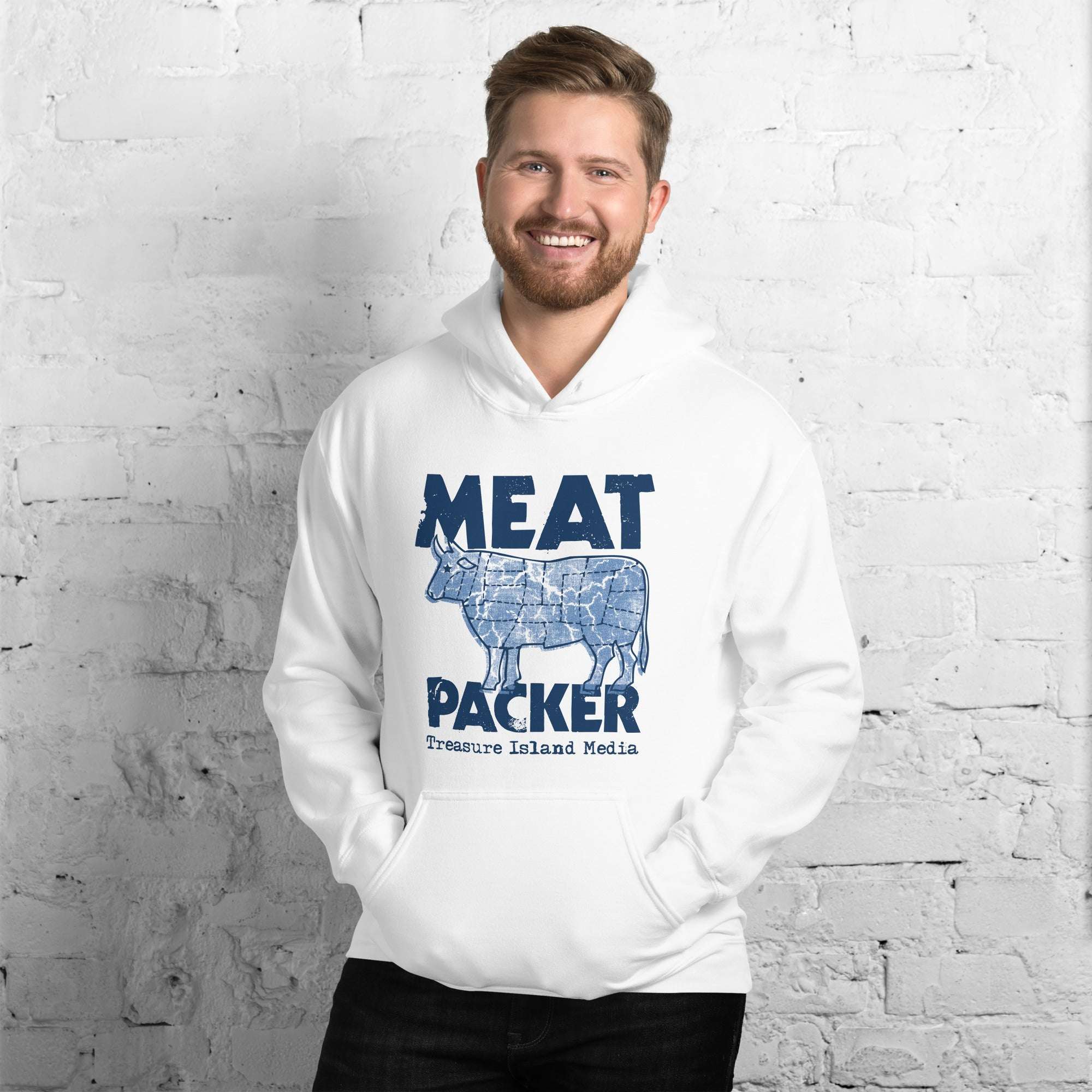 White Meat Packer Hoodie with cow print design, featuring a man smiling against a brick wall backdrop.