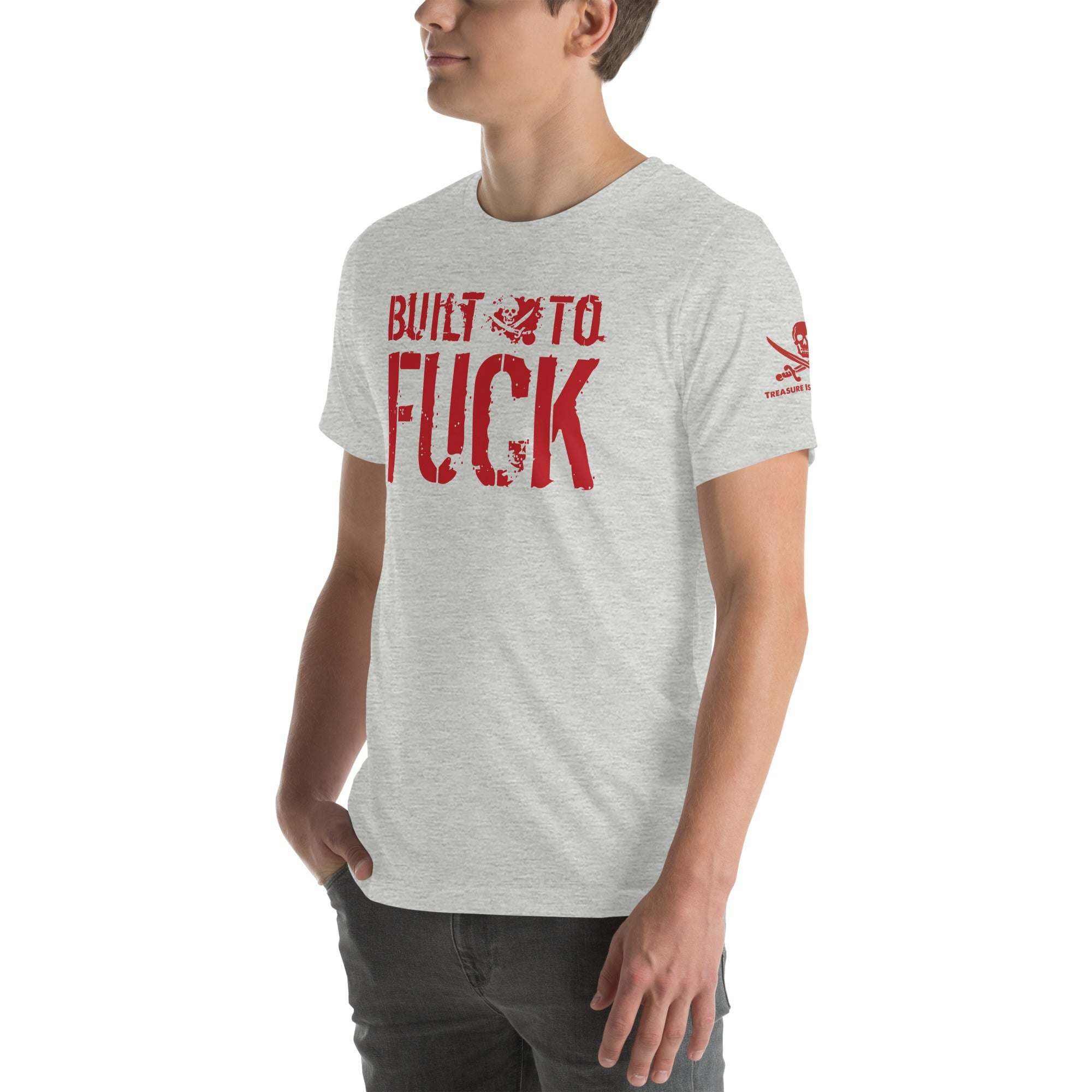 Man wearing grey Built to F*ck T-shirt with bold red text and skull graphic on front and sleeve