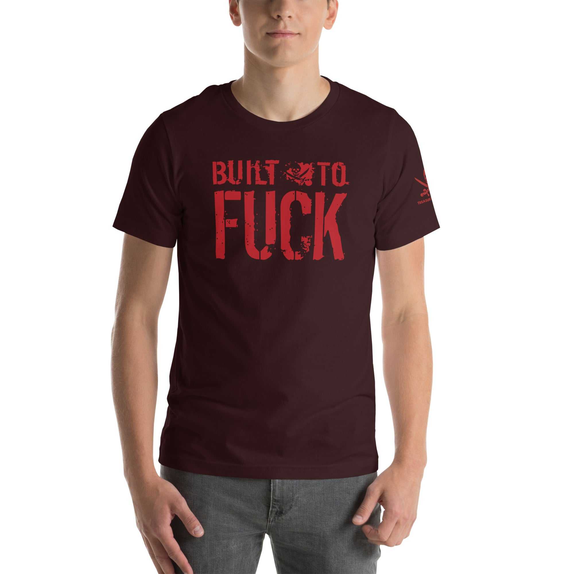 Man wearing a maroon Built to F*ck T-shirt with bold red printed text on the front.
