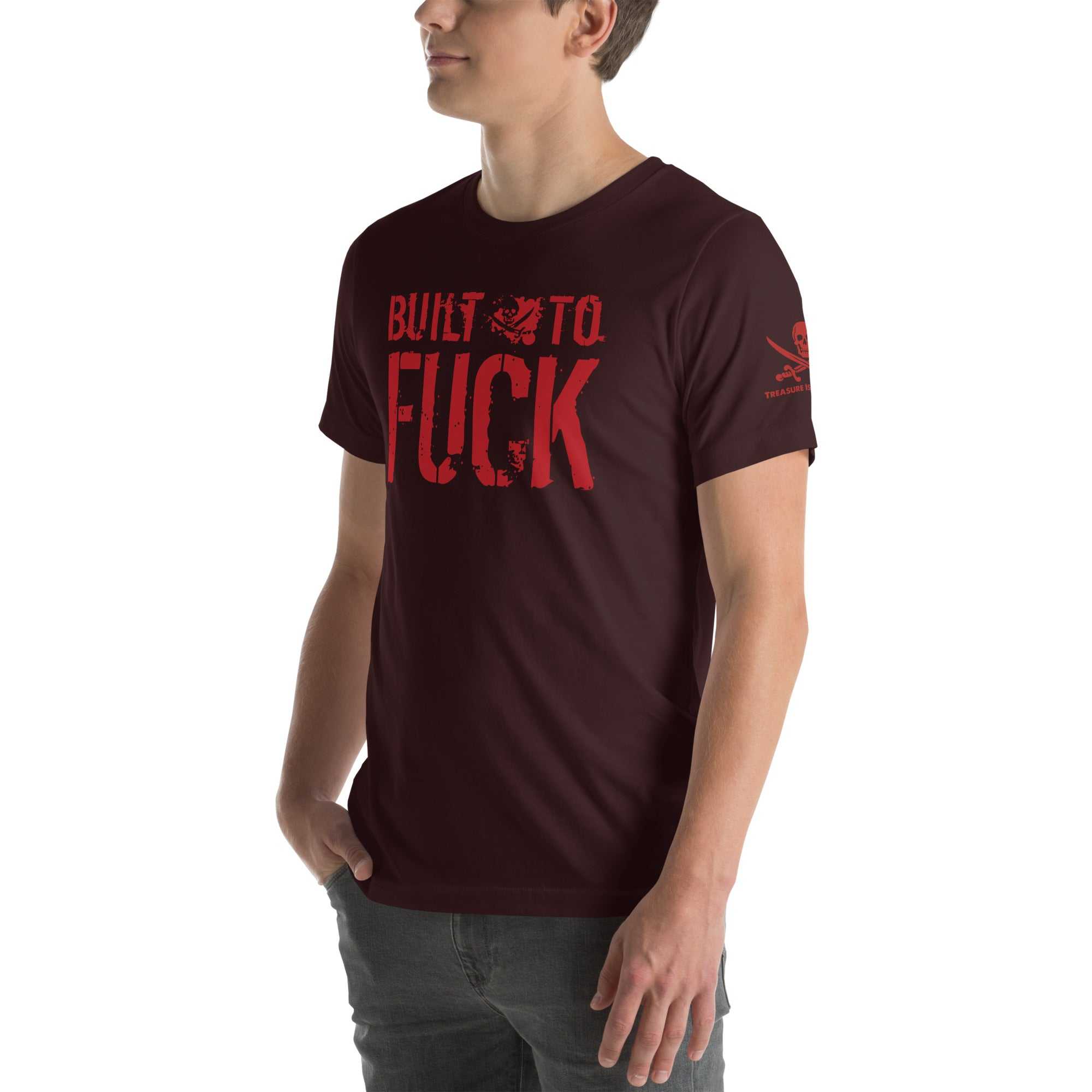Man wearing a dark maroon Built to F*ck T-shirt with bold red text and graphic design on front and sleeve