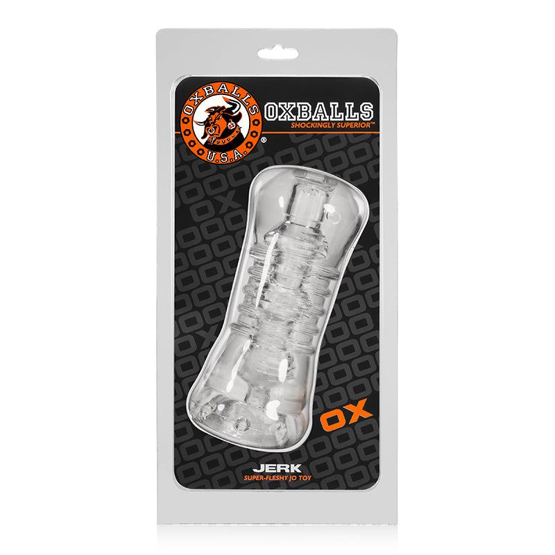 Clear OxBalls Jerk Masturbator in packaging, featuring flexible, ribbed design with clear material for enhanced visual experience.