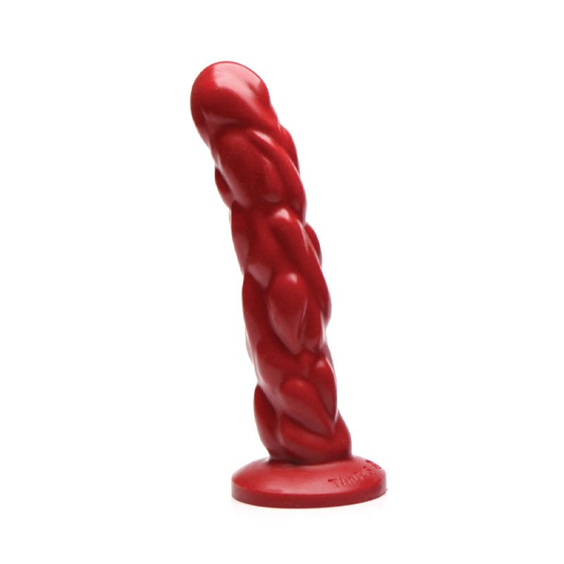 Tantus Paisley Premium Silicone Dildo in Ruby Red with organic curves and ridges.