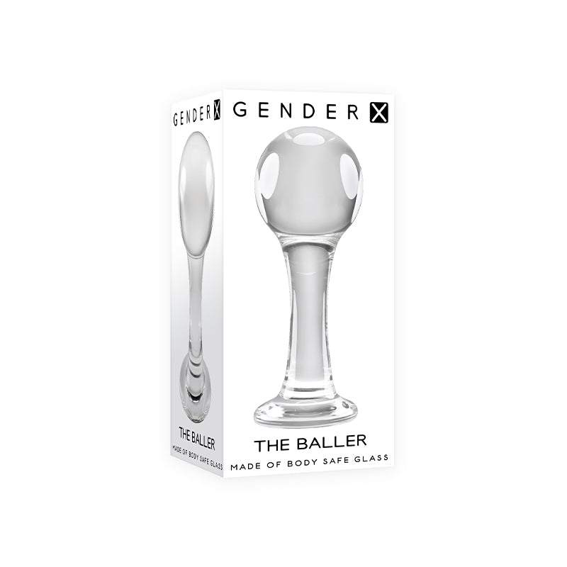 Clear Gender X The Baller round glass anal plug with smooth, tapered design in packaging
