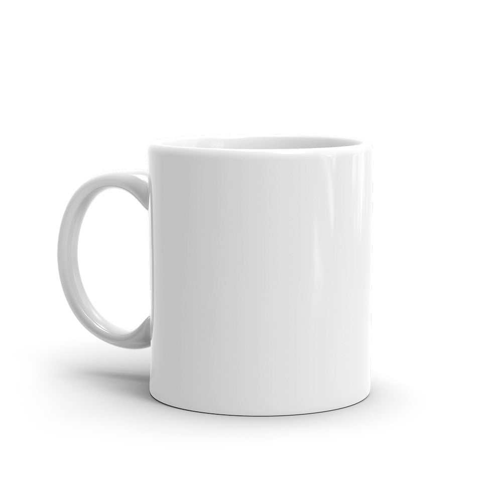 White ceramic mug with handle, blank surface, ideal for custom "I Heart TI Mug" design.