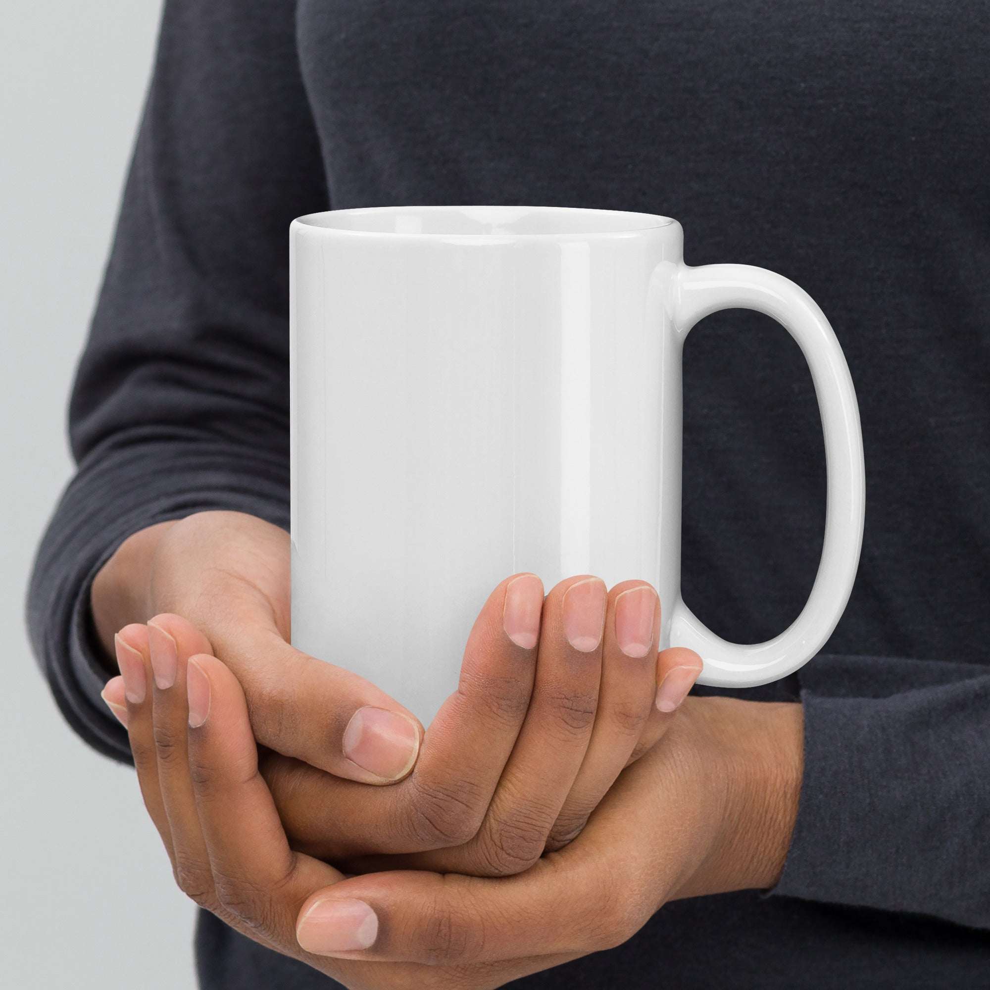 TIM 25th Anniversary Mug with iconic logo and sleek design.
