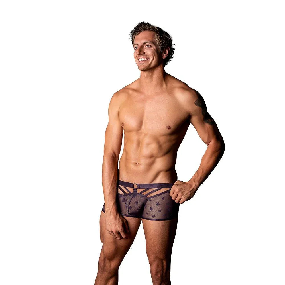 Male model wearing Male Power Love Star black and purple mesh trunks with front metal ring and star pattern