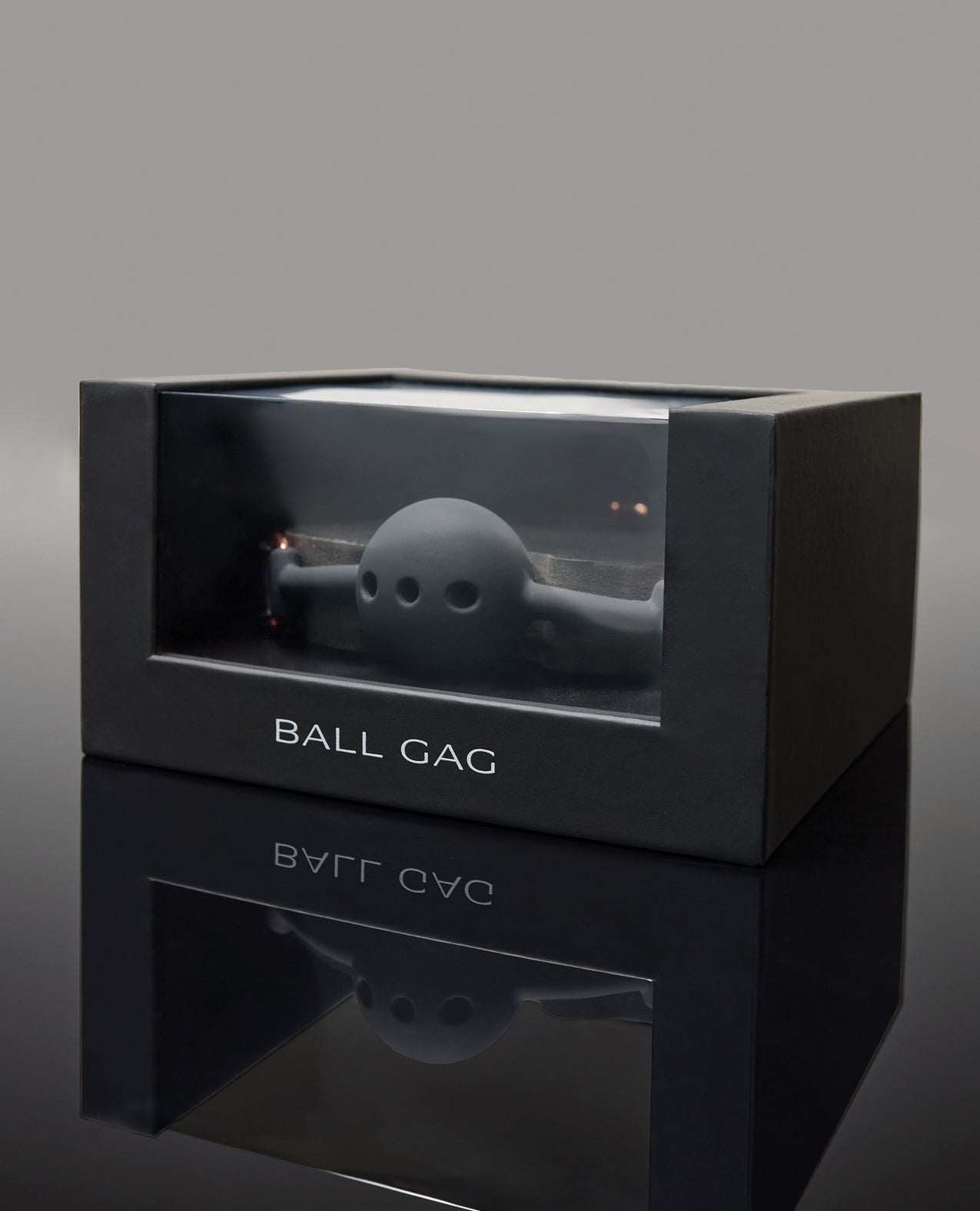 Pleasure Collection Adjustable Ball Gag in black silicone with rose gold accents in sleek black packaging