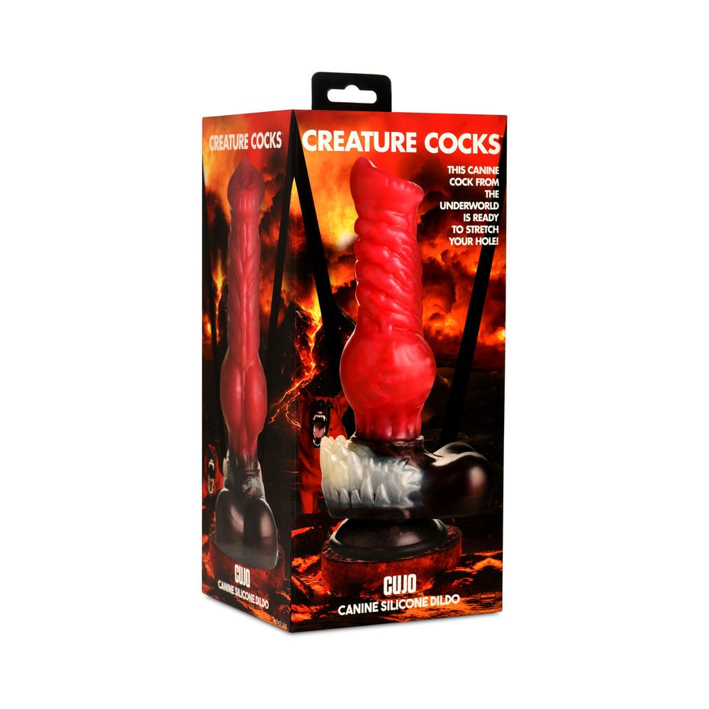 Creature Cocks Cujo Canine Silicone Dildo in red with textured shaft and suction cup base displayed in packaging.