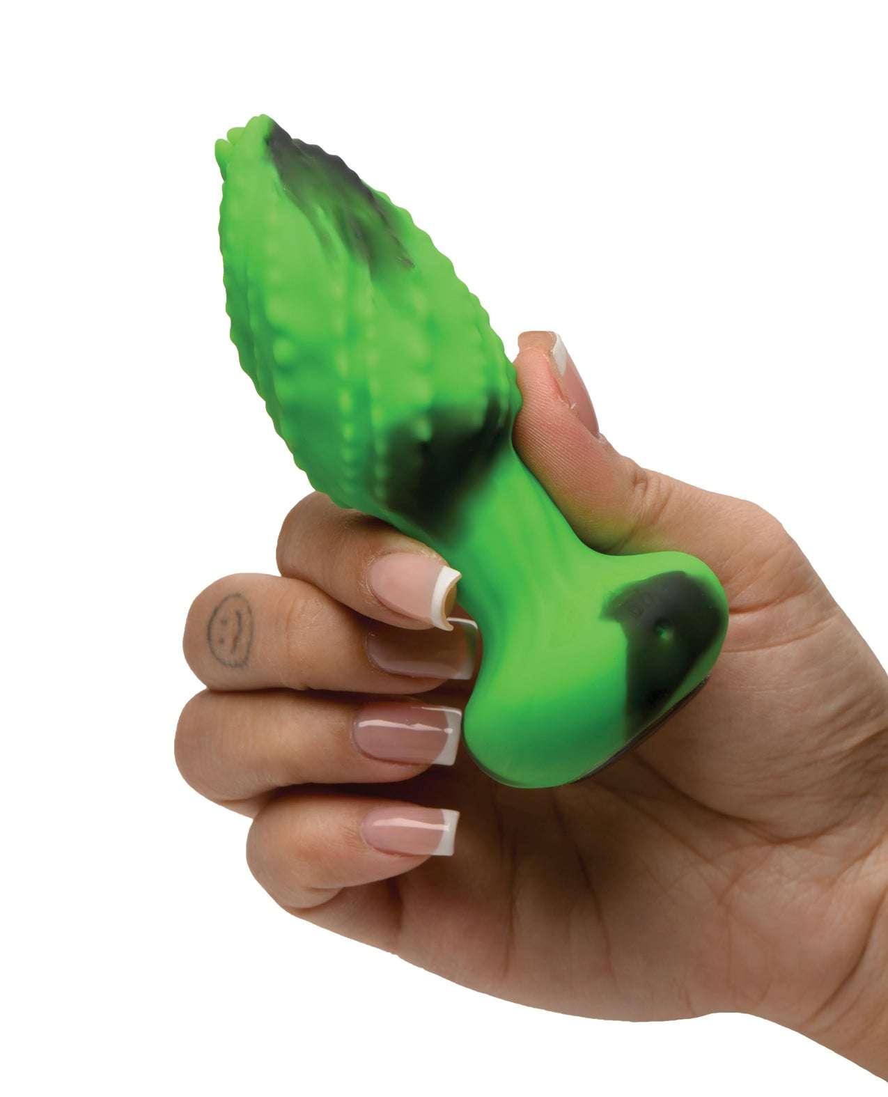 Hand holding green and black Creature Cocks - Eye of the Spawn vibrating silicone butt plug with textured ridges and tapered tip