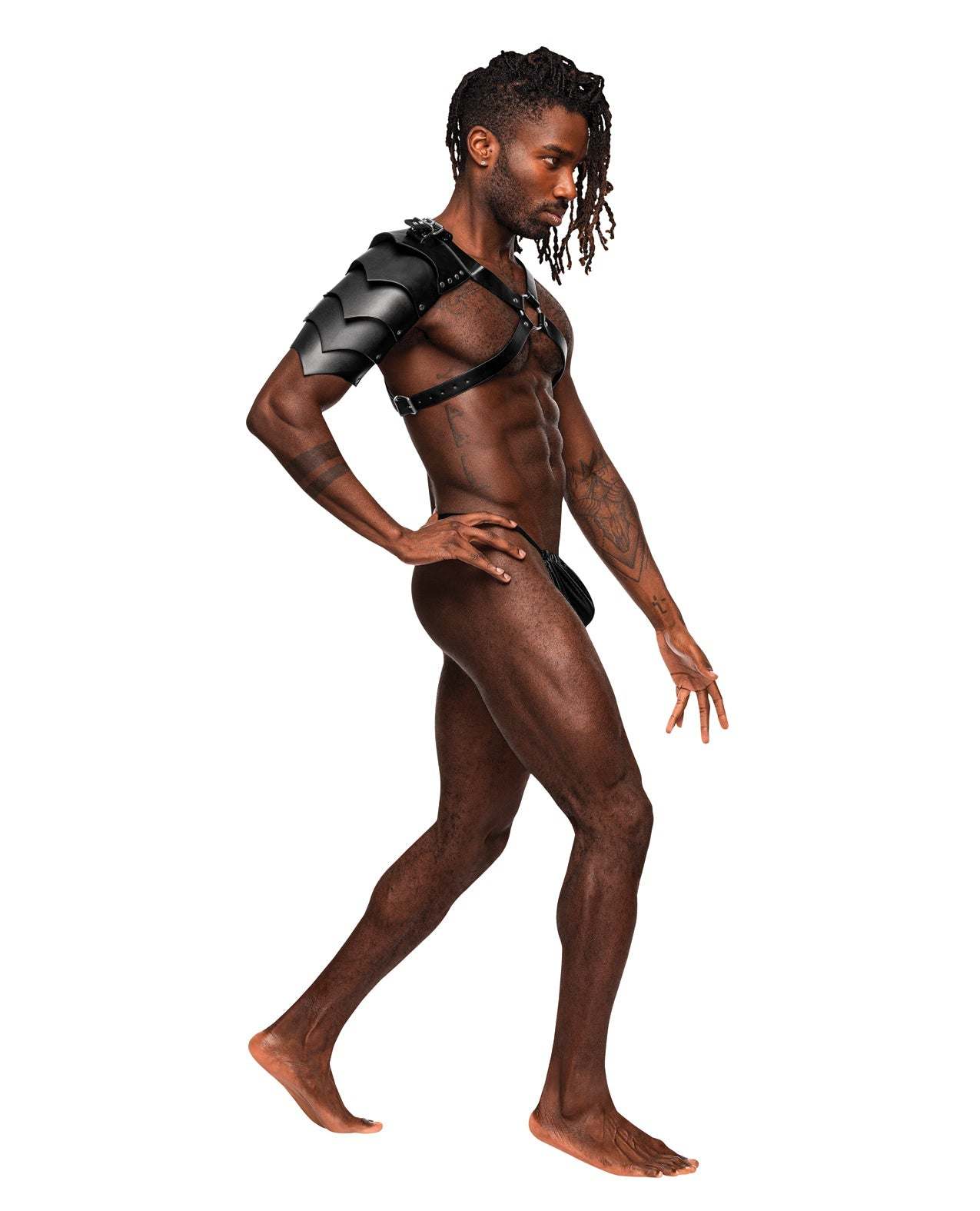 Male model wearing Aquarius PU leather chest harness with black half sleeve and adjustable buckled straps.