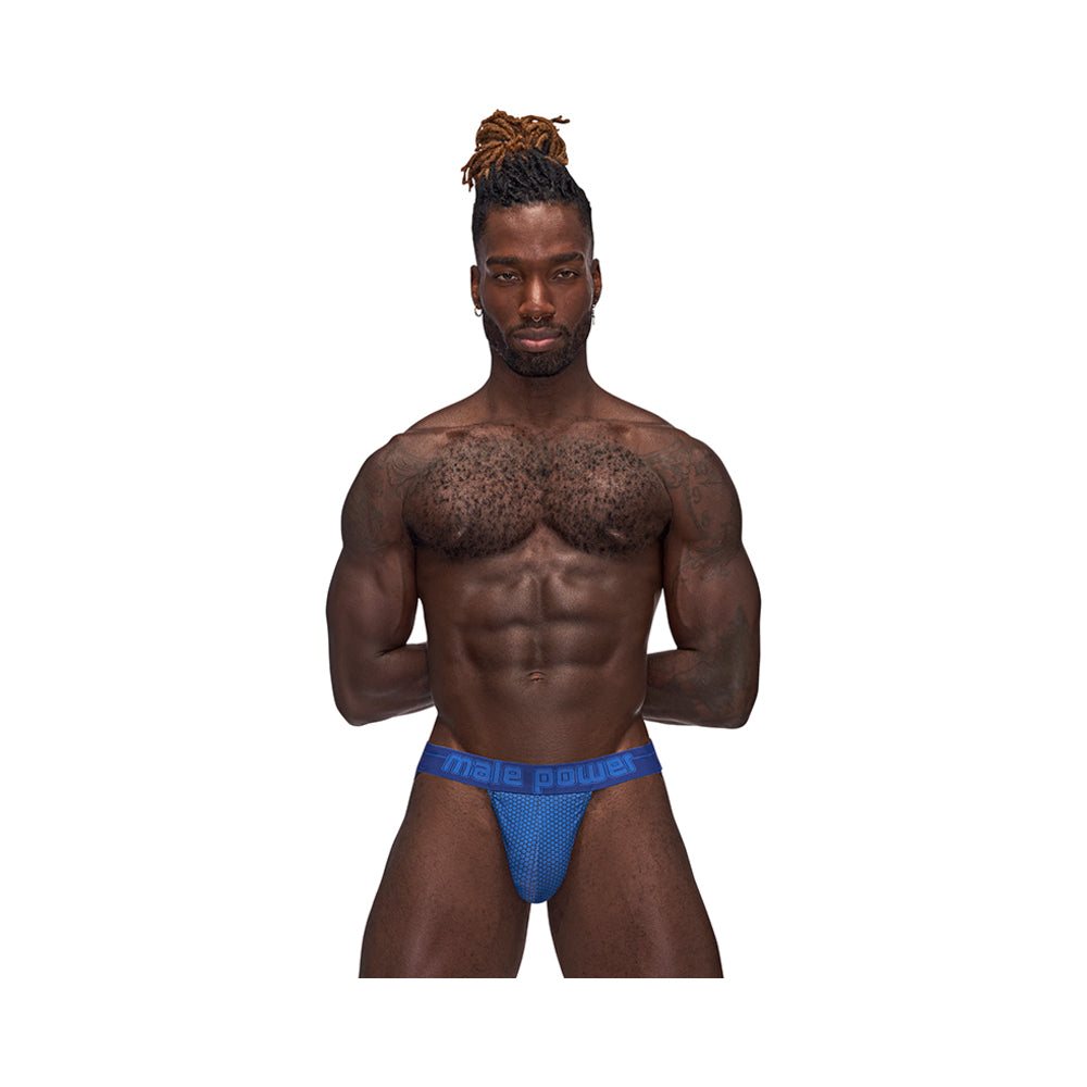 Male model wearing Male Power Sexagon strappy ring jock in royal blue with branded waistband and hexagon-print fabric