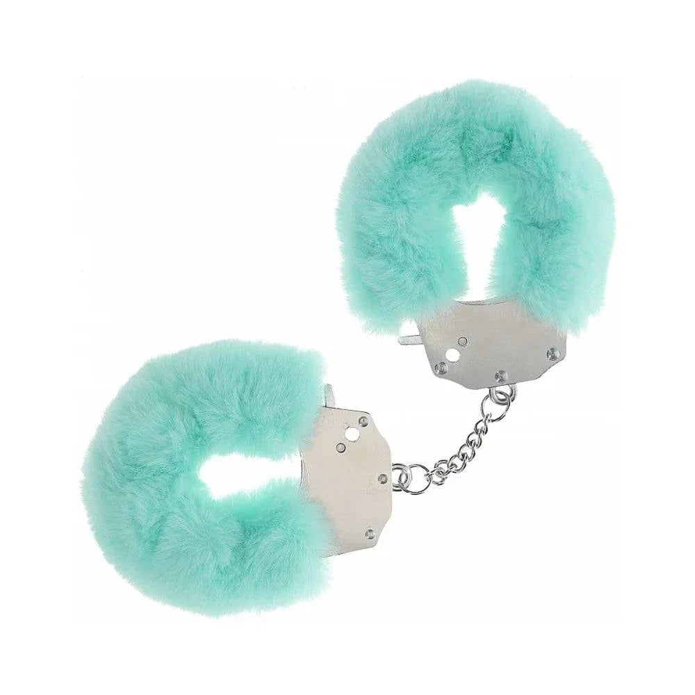Heavy-duty fluffy handcuffs with soft teal fur and durable metal, featuring a secure locking mechanism and quick-release button for safe, comfortable restraint.