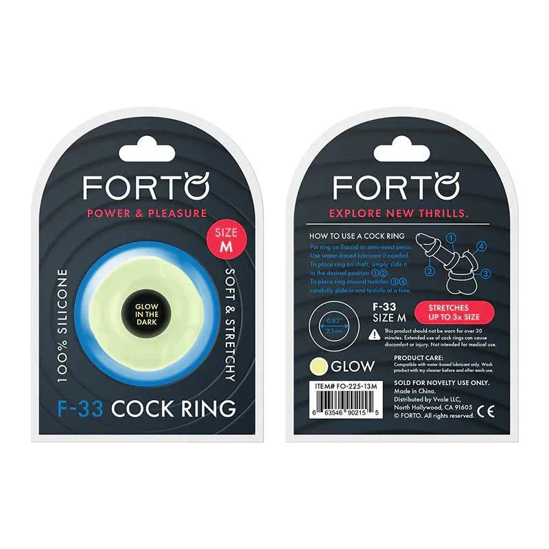 Forto F-33 liquid silicone glow-in-the-dark cockring in medium size with soft, stretchy material and packaging showing front and back details
